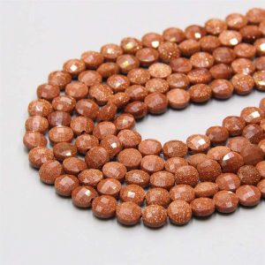 flat round beads goldstone